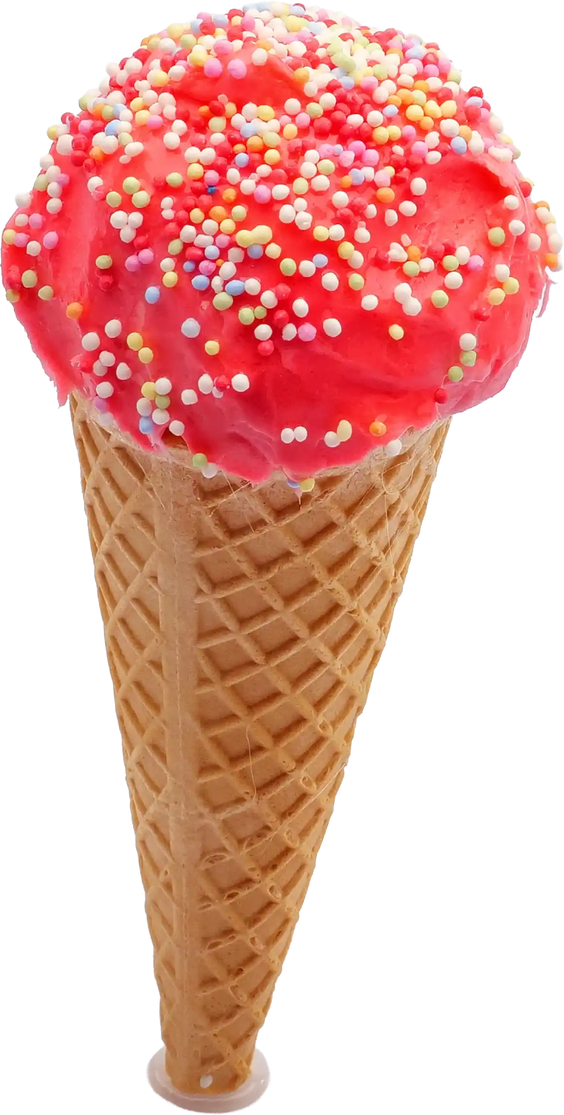 eiswaffel Bunte, kleine runde Zuckerperlen in den Farben Rot, Gelb, Blau, Orange und Weiß, die wild verstreut sind.